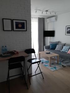 Posezení v ubytování Apartament Zamojska - GarwoNocka