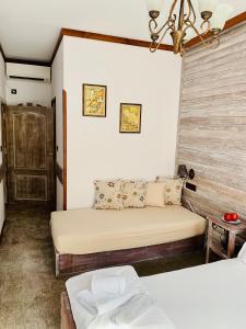 Posezení v ubytování Guest House Holiday in Melnik + 37 fotografií