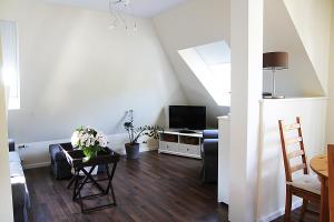 Televisyen dan/atau pusat hiburan di Lilienmatt Apartments