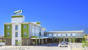 a rendering of a building with a parking lot at Travelodge in Gaborone