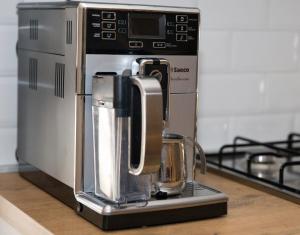 a coffee maker sitting on top of a kitchen counter at Antalóczy Vendégház in Tokaj
