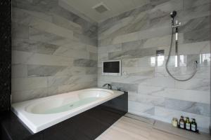 Vannituba majutusasutuses HOTEL GLANZ CASCATA