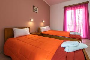 
Ein Bett oder Betten in einem Zimmer der Unterkunft Anthi Studios & Apartments
