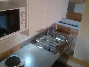 Η κουζίνα ή μικρή κουζίνα στο Privat Milan