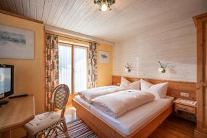 Postel nebo postele na pokoji v ubytování Haus Sieglinde