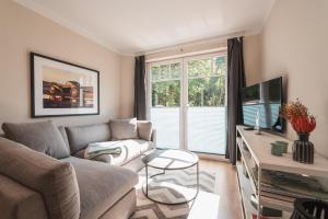 Et tv og/eller underholdning på Das Handtuchhaus - Wohnen im schmalsten Haus - Mittendrin