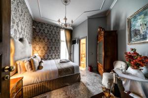 Posteľ alebo postele v izbe v ubytovaní Navona Grand Suite