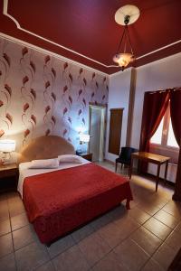 Postel nebo postele na pokoji v ubytování Exis Hotel