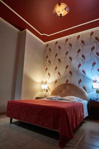 Postel nebo postele na pokoji v ubytování Exis Hotel
