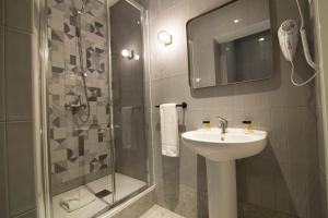 Łazienka w obiekcie Suites You Zinc