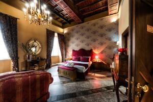 Posteľ alebo postele v izbe v ubytovaní Navona Grand Suite