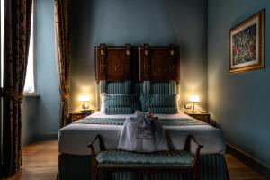 Posteľ alebo postele v izbe v ubytovaní Navona Grand Suite