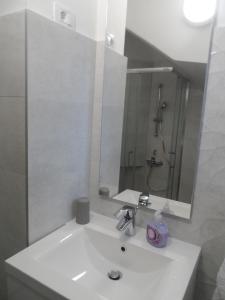 Koupelna v ubytování Apartmani Dropulić