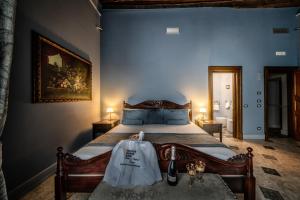 Posteľ alebo postele v izbe v ubytovaní Navona Grand Suite