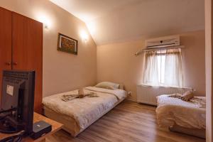 Cama o camas de una habitación en B&B Bebinac