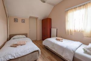 Cama o camas de una habitación en B&B Bebinac