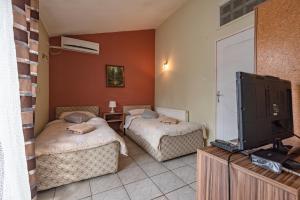 Cama o camas de una habitación en B&B Bebinac