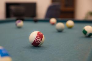 a billiard balls on a pool table at Sognhostel in Sørbø