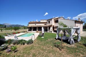 a house with a swimming pool in a yard at C277 Son Rubi by Mallorca Villa Selection in Selva
