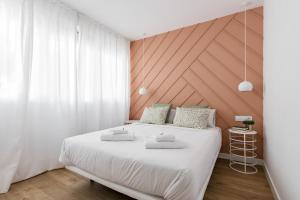 Łóżko lub łóżka w pokoju w obiekcie Style Apartments by Olala Homes