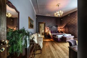 Posteľ alebo postele v izbe v ubytovaní Navona Grand Suite