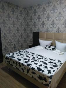 Cama o camas de una habitación en Отель Райский Уголок в Абхазии