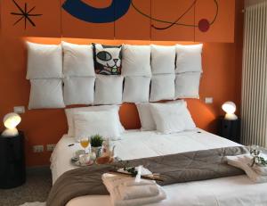 Postel nebo postele na pokoji v ubytování Il Piccolo Rooms