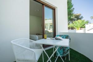 Patio lub wspólna przestrzeń na świeżym powietrzu w obiekcie Alidreams Carmen Beach Apartamentos