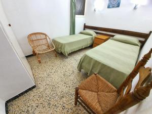 Postel nebo postele na pokoji v ubytování Apartamento Karina Beach-3