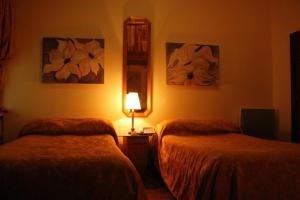 Cama ou camas em um quarto em Residencial Panorama