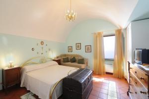 Voodi või voodid majutusasutuse Villa La Russelia toas