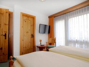 Postel nebo postele na pokoji v ubytování Ambiente Guesthouse