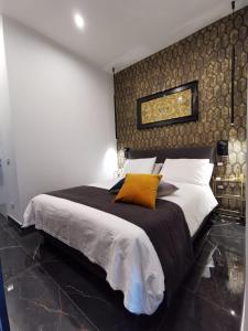 Letto o letti in una camera di Vomero Guest House