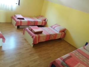 Voodi või voodid majutusasutuse Guesthouse Tomasevic toas
