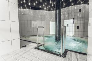 Koupelna v ubytování Braavo Spa Hotel