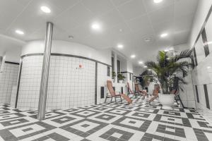 Fitness centrum a/nebo fitness zařízení v ubytování Braavo Spa Hotel