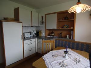 Kuchyň nebo kuchyňský kout v ubytování Gästehaus Gisela