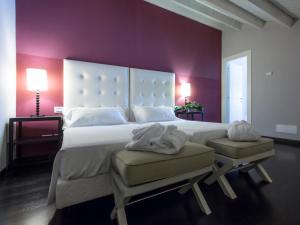 Letto o letti in una camera di Grand Hotel Villa Itria Congress & Spa