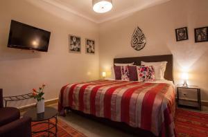 Postel nebo postele na pokoji v ubytování Riad Shanima SPA Marrakech