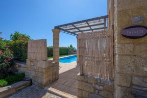 The swimming pool at or close to Trochalo Villas