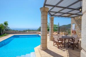 The swimming pool at or close to Trochalo Villas