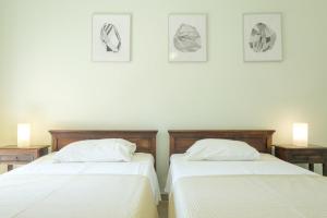 A bed or beds in a room at Trochalo Villas