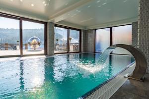Gallery image of MARION SPA - Breakfast included in the price Spa Swimming pool Sauna Hammam Jacuzzi Salt room Children's room Restaurant Parking 400 m to Bukovel Lift 1 Mountain view in Bukovel