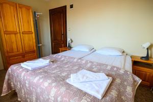 Cama o camas de una habitación en Hotel Chichin