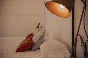 Postel nebo postele na pokoji v ubytování HOTEL LUZ ALMONASTER