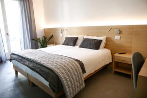 Postel nebo postele na pokoji v ubytování Bed and Bike Verona