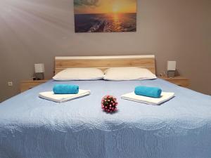 Postel nebo postele na pokoji v ubytování Apartman Nino