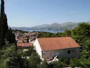 a house with a view of a town and a lake at Villa Radovic in Cavtat