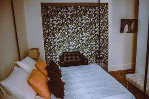 Postel nebo postele na pokoji v ubytování HOTEL LUZ ALMONASTER