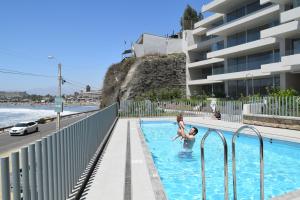 Het zwembad bij of vlak bij Pura Vida - nuevo apartamento con salida directa a la costa